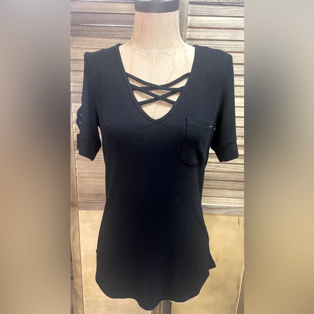 Bebe V-neck top with crisscross detail!